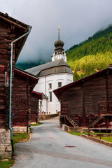 View of the parish church of the Nativity of Mary in Reckingen, Switzerland.