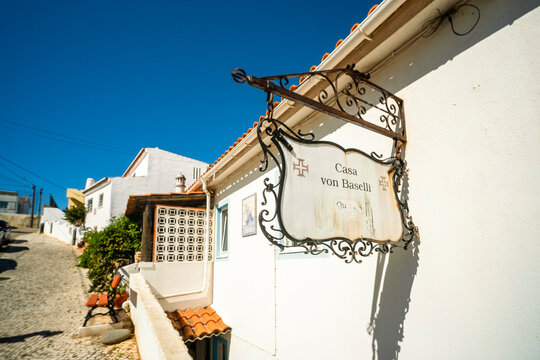 Charming house in Carvoeiro, Portugal, showcasing traditional architecture, bright exterior, and Mediterranean-style details