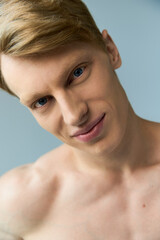 Modern masculinity expressed through the charm of a young and alluring man