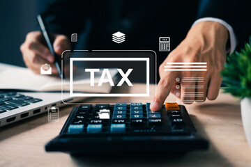 Close-up of hand pressing calculator with tax icons overlay, representing financial data analysis,...