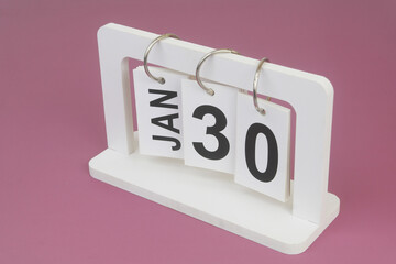 January, 30 on calendar on purple background.