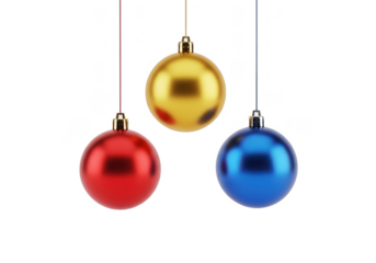 Three colorful christmas baubles, red, gold, and blue, hanging on strings isolated on transparent background