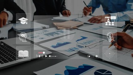 A diverse group of professionals engages in a business meeting, surrounded by charts and data sheets, embodying collaboration, strategy, and innovation in a modern office. Raster - Powered by Adobe