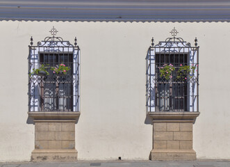 colonial colorful buildings in antigua guatemala detail window door grate gate windows cornice...