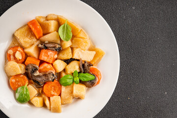 Potato stew mushrooms and vegetables natural tasty snack fresh delicious gourmet food background on the table rustic top view copy space keto and paleo diet vegerian and vegan food