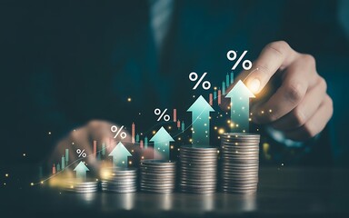 Businessman using laptop with heap of coins and arrow up with percentage symbol for financial increase interest rate or mortgage investment dividend from business growth concept..