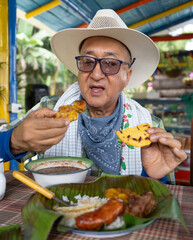 Coffee farmer man having lunch Colombian food