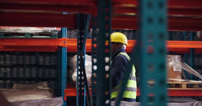 Logistics, dancing and black man in warehouse, clipboard and achievement with success. African person, movement and employee in workplace, excited and celebration with distribution and job promotion - Powered by Adobe