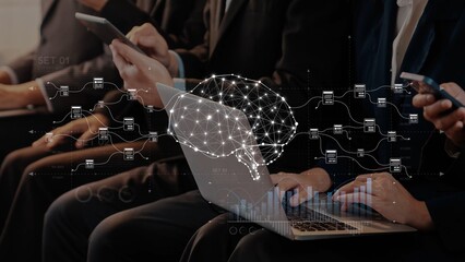 A group of professionals engaged in a business meeting using devices, visualizing data with a brain network concept, illustrating innovation and digital transformation. Raster