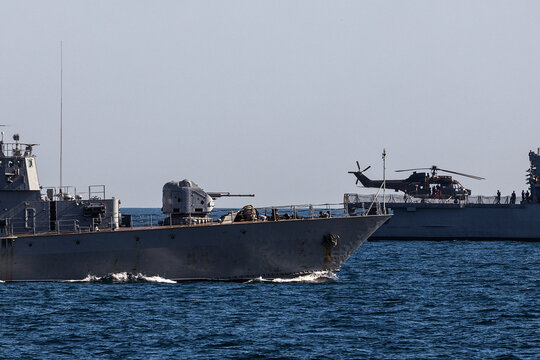 Formation of warships in the Black Sea during a peacekeeping operation. Тhree battleships in action.
