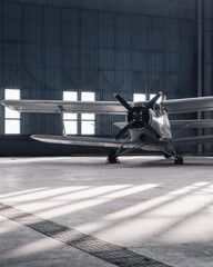 Front view of an old propeller aircraft in a hangar. White biplane aircraft in roomy sunlit hangar. © andrbk