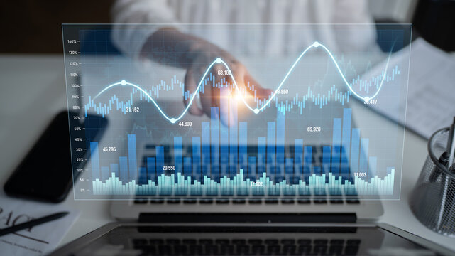 A modern business setting with a laptop displaying a data visualization dashboard. Charts and graphs showcase financial trends and insights for informed decision-making. Scalp