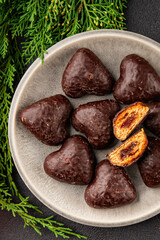 Gingerbread chocolate heart shaped honey cakes Christmas sweet dessert new year natural product tasty snack fresh delicious gourmet food background on the table rustic top view copy space