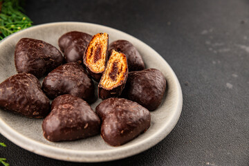 Gingerbread chocolate heart shaped honey cakes Christmas sweet dessert new year natural product tasty snack fresh delicious gourmet food background on the table rustic top view copy space