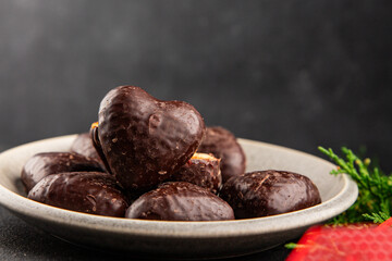 Gingerbread chocolate heart shaped honey cakes Christmas sweet dessert new year natural product tasty snack fresh delicious gourmet food background on the table rustic top view copy space
