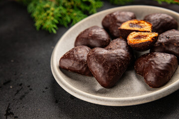Gingerbread chocolate heart shaped honey cakes Christmas sweet dessert new year natural product tasty snack fresh delicious gourmet food background on the table rustic top view copy space