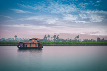 Fototapeta premium Kerala's beauty of Alappuzha's water and houseboats