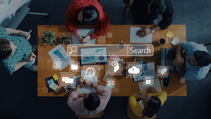 A diverse team collaborates on a digital marketing strategy in a modern workspace, with a search interface overlaid, representing innovative ideas and teamwork. Trope