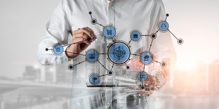 A business professional engages with digital technology, illustrating a global network connection amid an urban city background, highlighting innovation and growth. Tessel