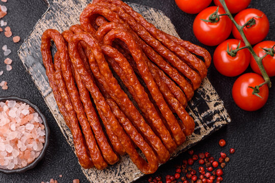 Smoked cabanossi, thin salami sausage, meat sticks, or snacks. Cabanossi sausage