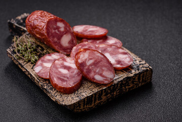 Smoked salami, thin beef or pork sausage, meat snacks. Salami sausage