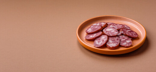 Smoked salami, thin beef or pork sausage, meat snacks. Salami sausage