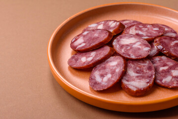 Smoked salami, thin beef or pork sausage, meat snacks. Salami sausage