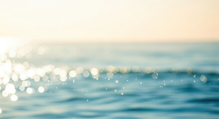 Soft focus, bokeh effect on the ocean surface with gentle waves reflecting sunlight, creating a serene and tranquil atmosphere