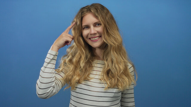 Woman head pointing studio blonde young thinking idea concept smiling makes inspiring portrait. - Powered by Adobe