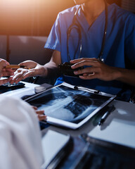 Doctors are meeting at the hospital to discuss treatment options and share experiences with colleagues.