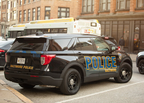 A Baltimore police car is parked in historic downtown Baltimore, Maryland, U.S. February 25, 2025