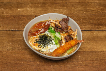 Spicy Karai Ramen Bowl with miso base, chili paste, 8. Ground pork, black beans, and fried onions