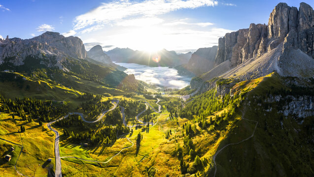 Aerial view of Gardena Pass in the Italian Dolomites during morning golden hour