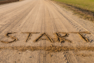 inscription on a dirt road the words 