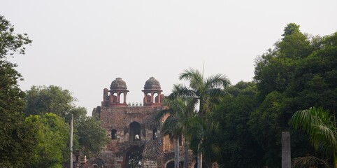 Old Fort Entrance Framed by Dense Green Trees