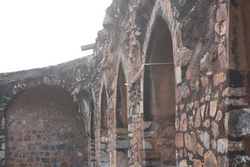 Stone Archway and Weathered Wall of Ancient Indian Fort