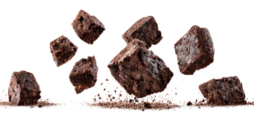  A close up of brownies in the air with the word chocolate on the bottom