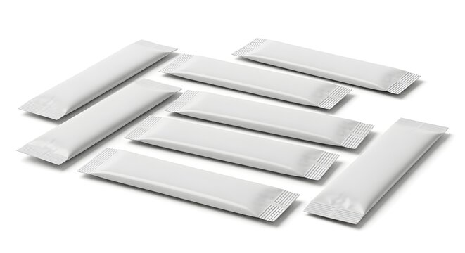 Multiple white individual packets of dry powder or granular product arranged on a white background