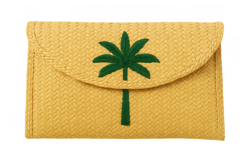 Yellow straw clutch bag with palm tree embroidery presenting tropical fashion