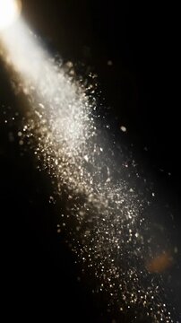 Extremely slow motion of tiny microscopic dust particles floating and swirling gently in a dark, mysterious ambient light beam magic, low key lighting, mystical