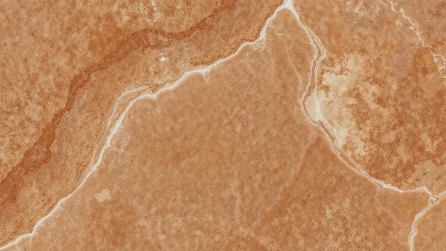 Aerial view of a desert landscape with winding river channels and dry terrain. - Powered by Adobe