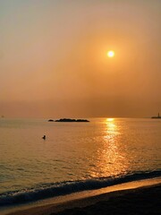  Golden Sunset Reflection on the Calm Ocean Surface