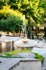 The elegant architectural details, terraces, lanterns, and lake view create a scenic and atmospheric composition. Perfect for themes of travel, architecture, parks, outdoor landscapes, and cultural la