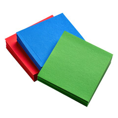 Three stacks of bright red, blue, and green colored paper squares