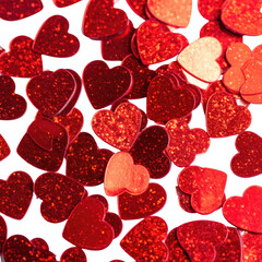 Heart confetti background. Red, shimmery texture, and lovely shape