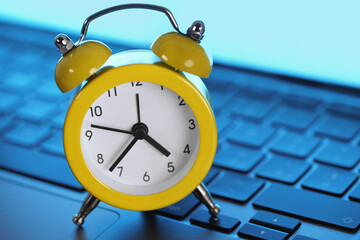 Alarm Clock On Laptop Computer Online Business Deadline Concept