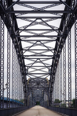 old bridge with steel struts