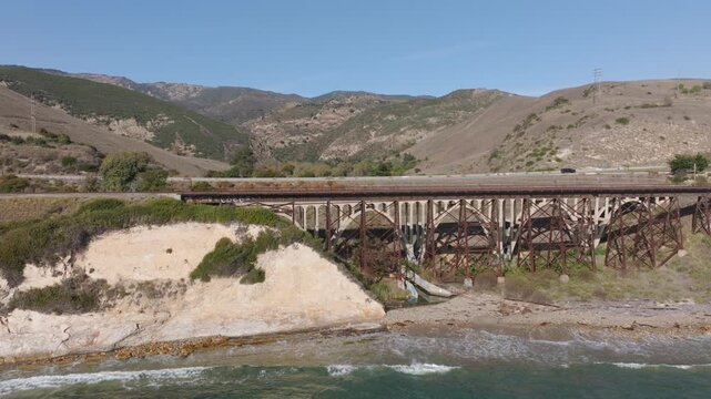Gaviota, California - Aerial Drone View of Gaviota Bridge With Train Tracks in Santa Barbara County, Next to the US Route 101 Freeway, Next to the Pacific Ocean on a Sunny Day