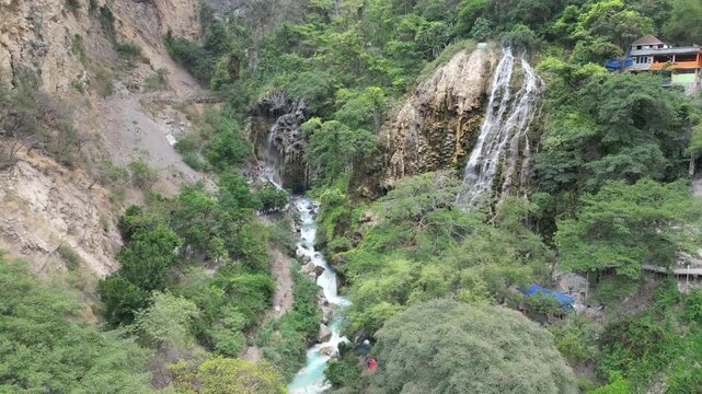 Tourists Exploring Natural Limestone Cave Chambers grutas tolantango