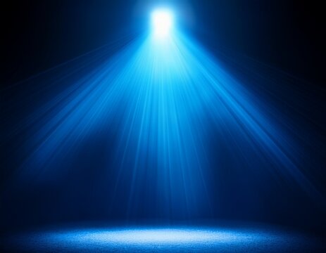 blue spotlight on dark stage - Powered by Adobe